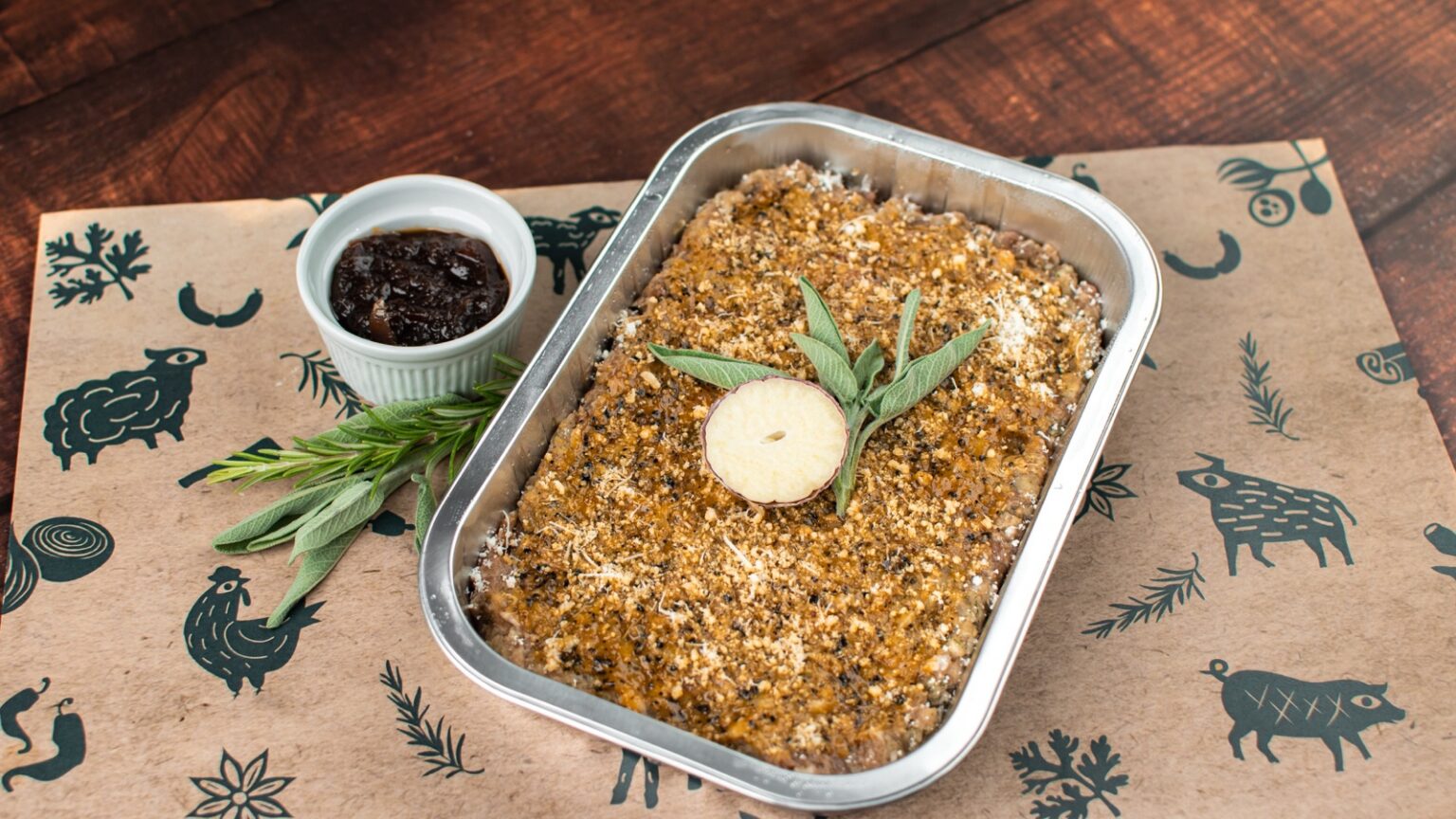 Smoked apple, cinnamon and truffle sausage meat stuffing traybake with Parmesan and sage