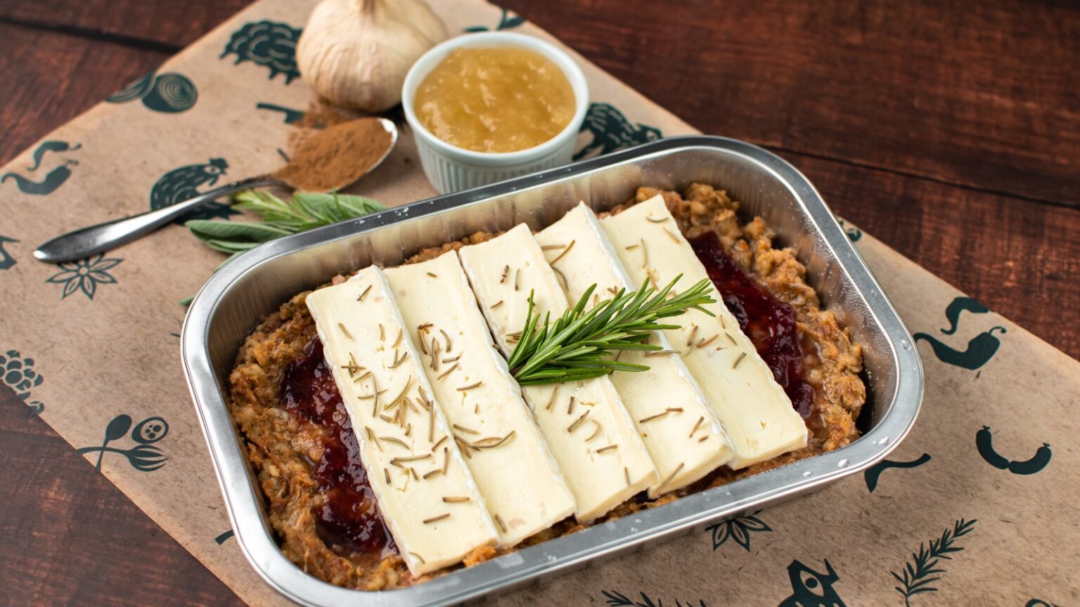 Smoked apple, cranberry and Brie sausage meat traybake finished with rosemary